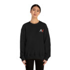 A young light skin tone female model wearing a black sweatshirt with stylized "AC" over the left breast denoting sickle cell trait status.